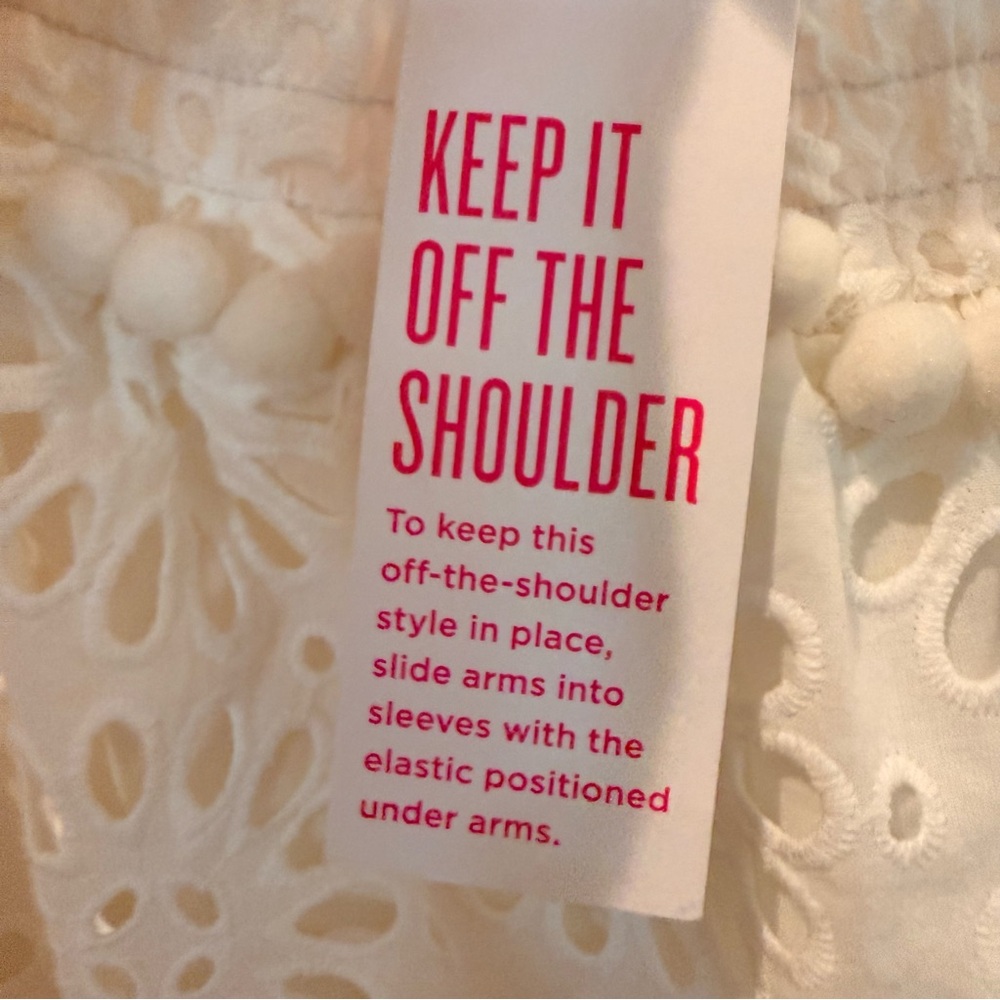 Your summer goto Lilly Pulitzer White Eyelet Off-Shoulder Tunic with PomPom Trim - Picture 8 of 10